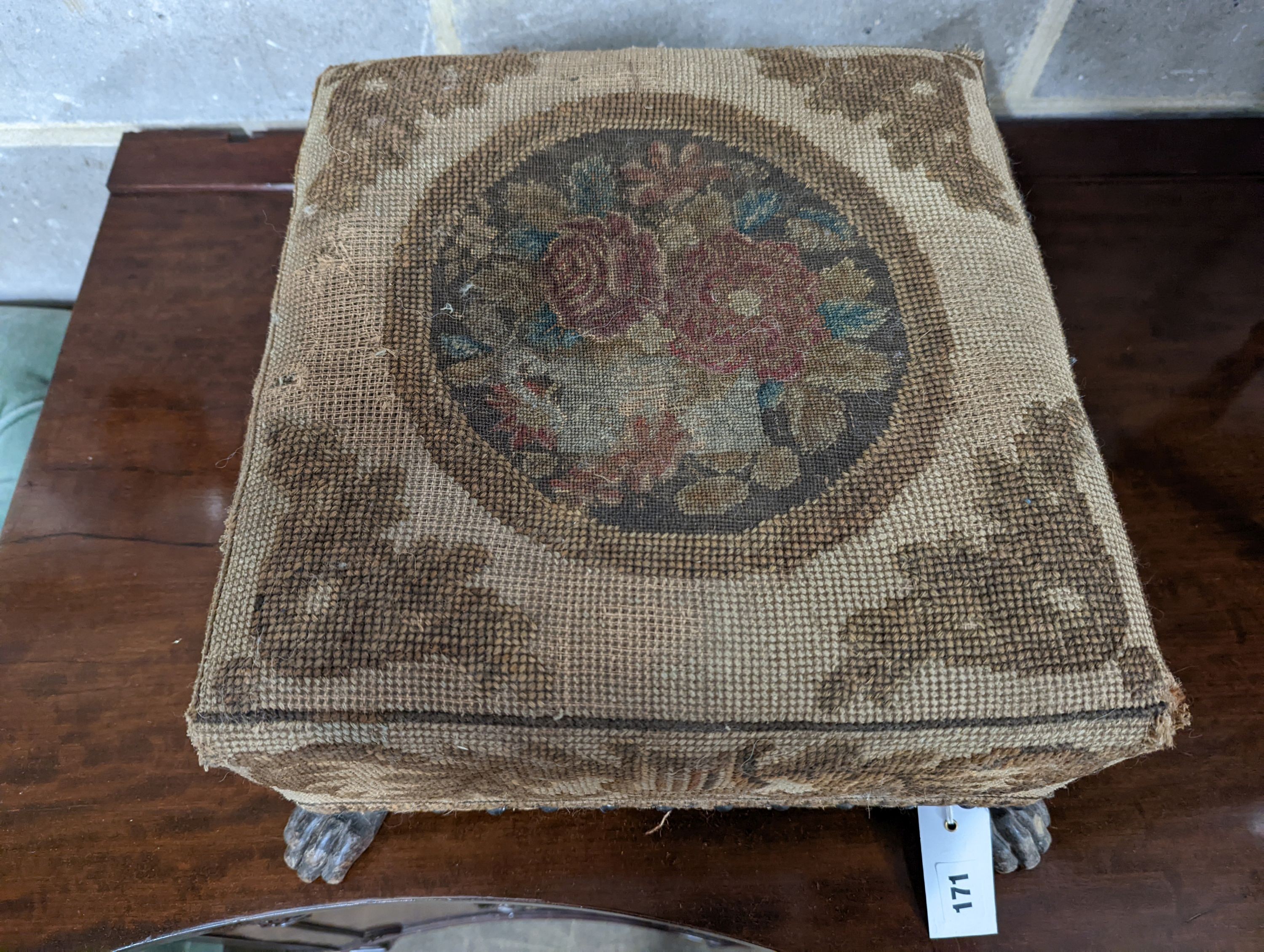 A Victorian tapestry embroidered square footstool, width 40cm, depth 36cm, height 22cm